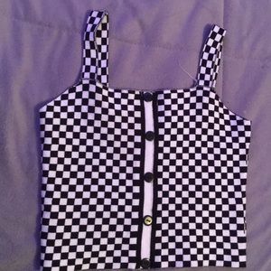 Cropped checkerboard never  worn